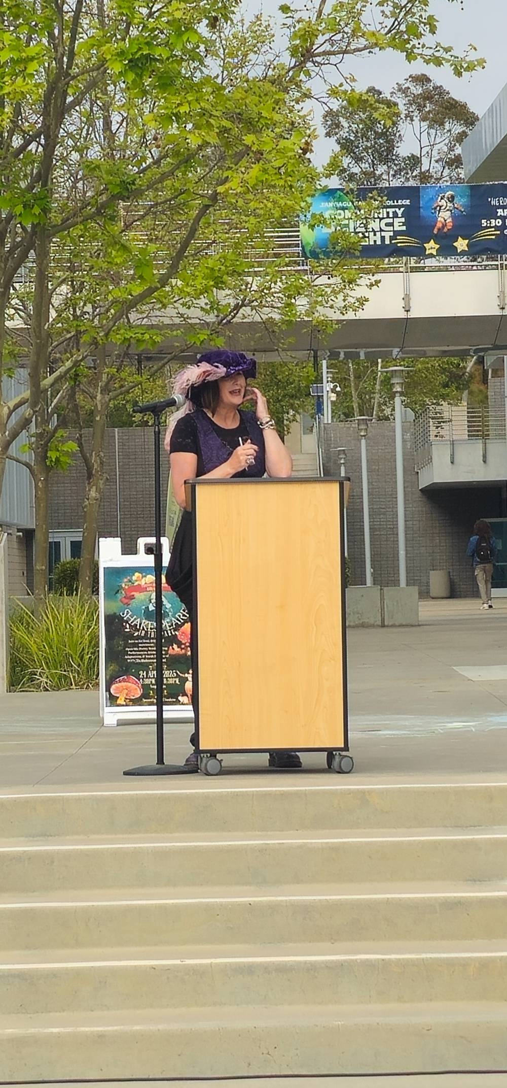 SCC Professor Corinna Evett of the English Department speaks at the 2026 Shakespeare in the Park event. 
