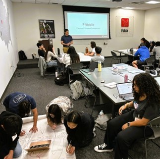 students in a classroom working in small groups