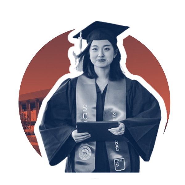 branded grad with SCC building in the background